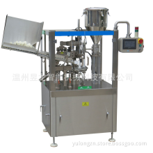 Automatic tube filling and sealing machine
